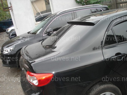 Спойлер лип багажника Toyota Corolla 2007-2012 стеклопластик под покраску